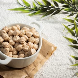 closeup-small-bowl-chickpeas-decorated-with-plant-branches